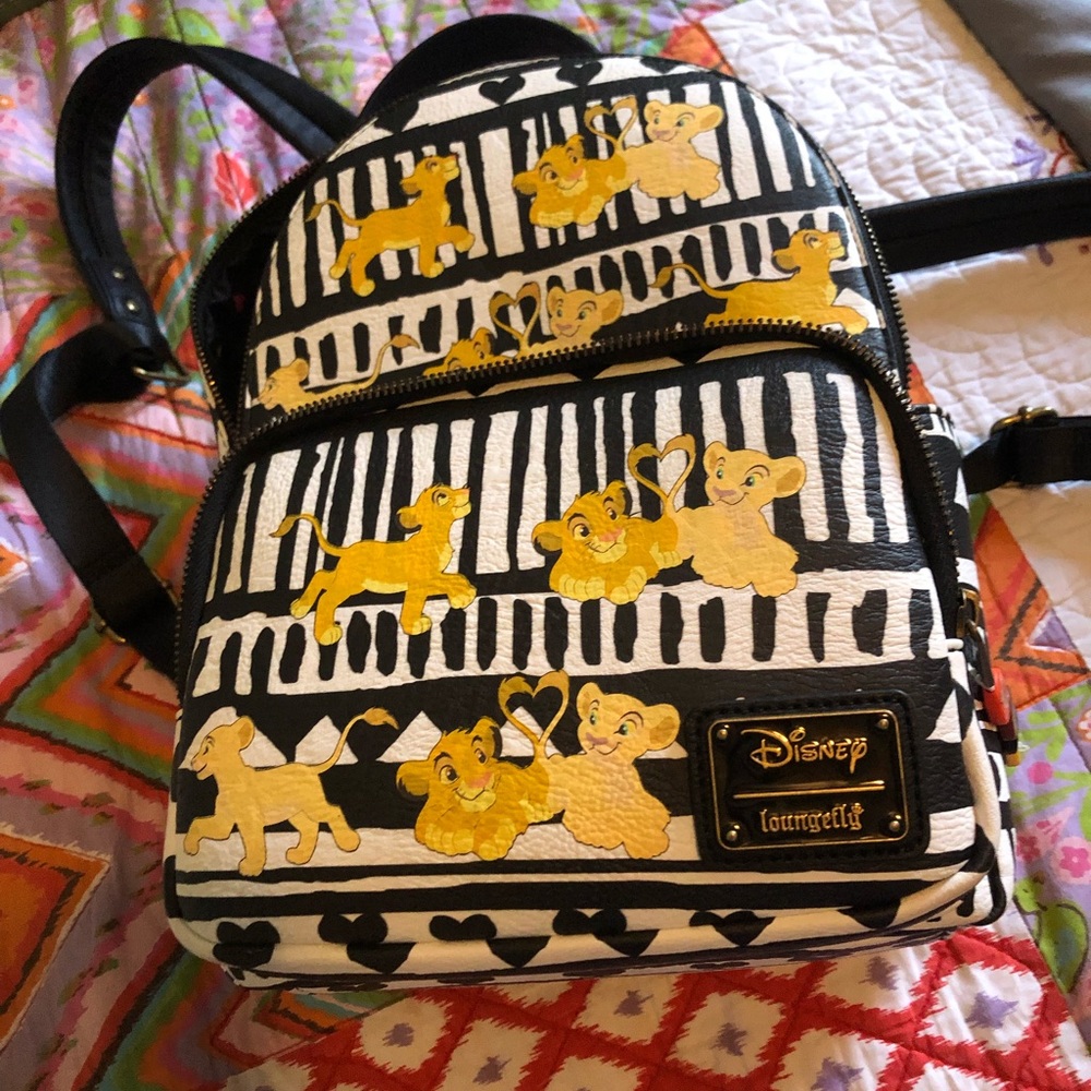 Loungefly Disney Simba and Nala tribal backpack